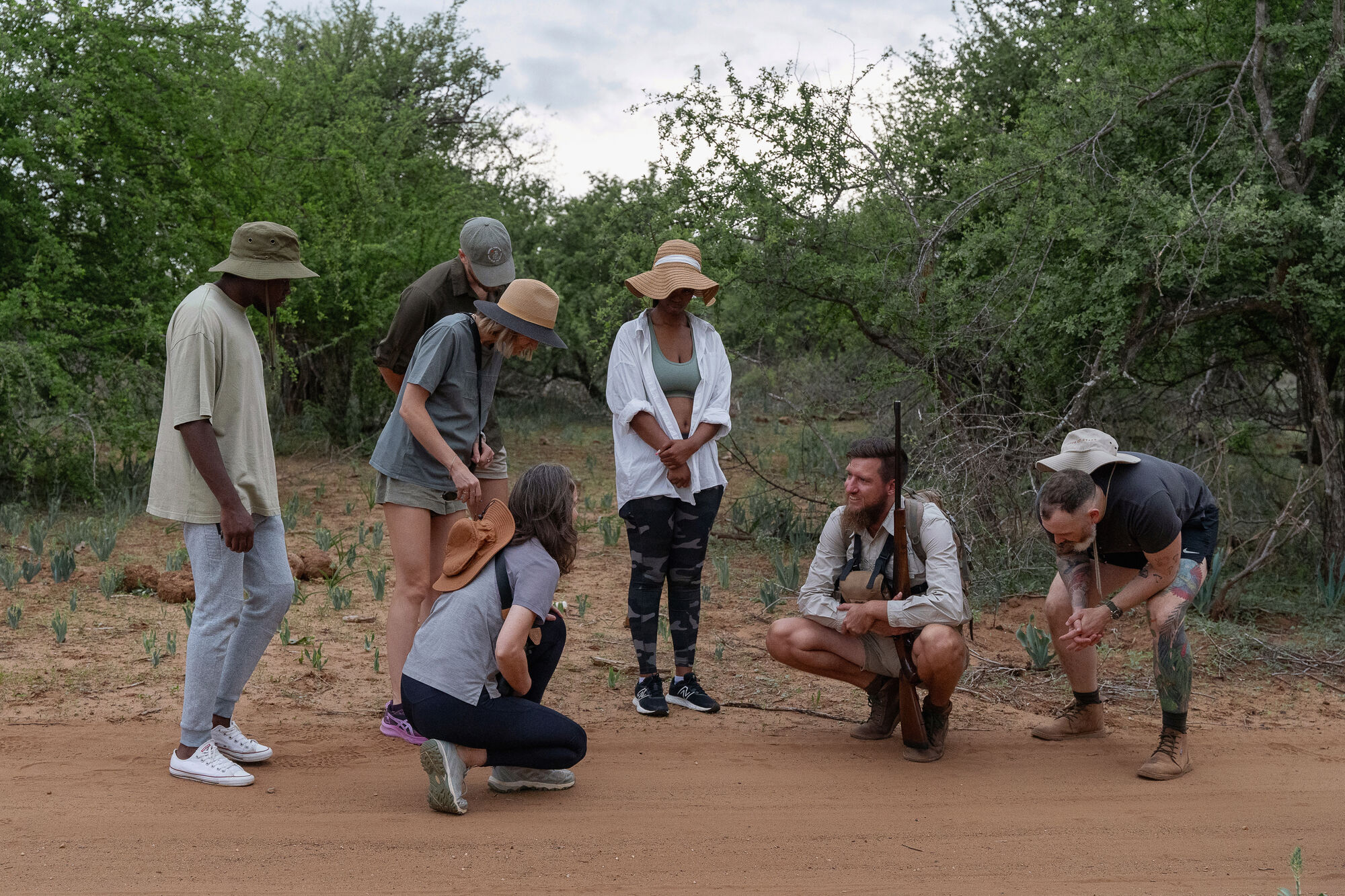 Group gathered around the ranger during a guided bushwalk