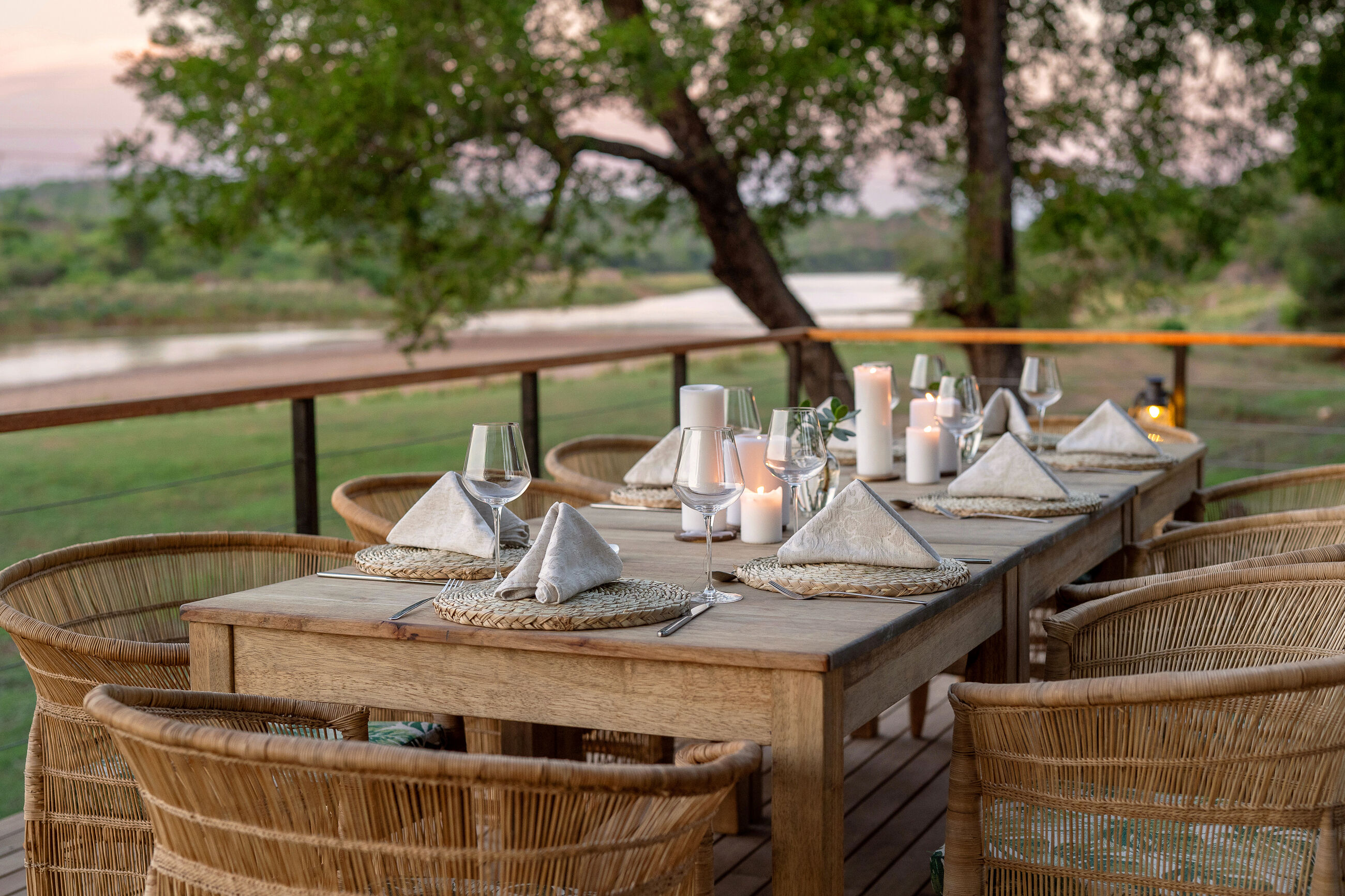 Long-table dinner at dusk
